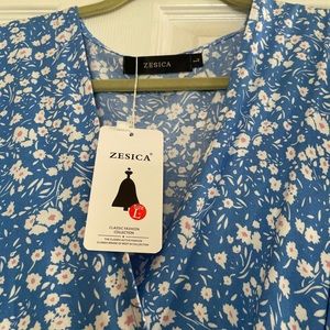 Light blue and white floral wrap dress